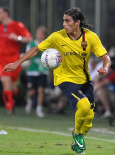 �}���e�B���E�J�Z���X